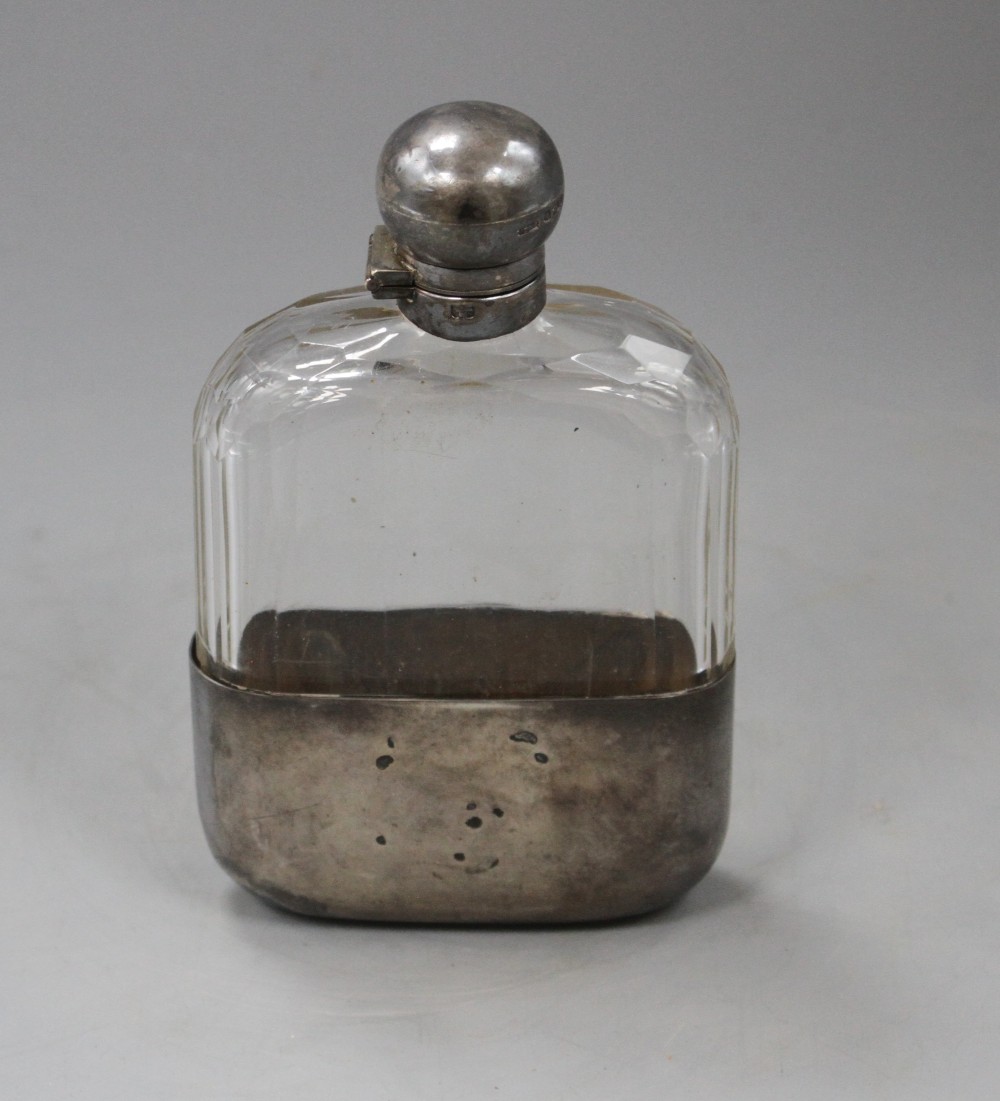 A Victorian silver mounted cut glass hip flask by James Dixon & Sons, Sheffield, 1891, 15.4cm.